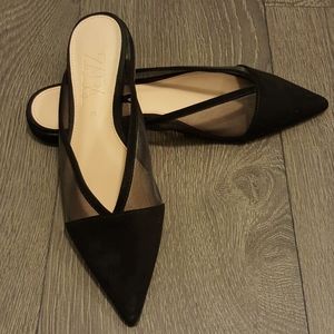 Black pointed toe mules